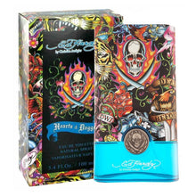 Load image into Gallery viewer, Ed Hardy Hearts &amp; Daggers Cologne by Christian Audigier, Released in November 2009 alongside its feminine counterpart, Ed Hardy Hearts &amp; Daggers is a sharp and lively modern cologne by fashion designer Christian Audigier, featuring a design by tattoo artist Don Ed Hardy. Fresh and spicy with woody undertones, it makes a strong fit for an outgoing, upbeat man.  Notes:  The top notes feature a martini accord with anjou pear and basil, while the heart delivers a kick of papaya and pepper accented with rosemary