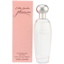 Load image into Gallery viewer, Pleasures Perfume by Estee Lauder, Released in the year 1995, Pleasures is a flowery, delicate perfume designed for women.  Notes:  This feminine fragrance features red berries and pink pepper in the top accords before giving way to the floral aroma of freesia and violet. The heart of this scent is light and fresh, utilizing notes of rose, peony, lily, and lilac to give the middle an aura of femininit