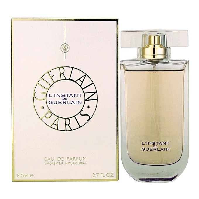 L'instant Perfume by Guerlain, Indulge your senses in the opening red apple, mandarin, and bergamot notes of L'instant.  Notes:  The floral essence of the perfume emerges at its heart with notes of iris, jasmine, and Chinese magnolia blossom.  The scent closes delicately with warm and sweet notes of vanilla, amber, musk, and white honey.