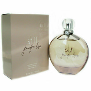 Still Perfume by Jennifer Lopez, Still is a clean and floral fragrance that was released in 2003 with top notes of white pepper, mandarin, Earl Grey tea, and sake. The scents heart contains freesia, rose, jasmine, orange blossom, and lily-of-the valley. The base notes are woody with sandalwood, musk, amber, orris, and pepper accords