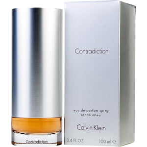 Contradiction Perfume by Calvin Klein, Contradiction is a floral woody musk women’s perfume that was designed in 1998 by perfumer Ann Gottlieb.   Notes: It has a floral, woody, white floral, balsamic, rose, and fresh main accords. Head notes of lily, peony, orchid, lily-of-the-valley, rose, and jasmine opens this fragrance, leading to heart notes of eucalyptus, lilac, and blackberry. 