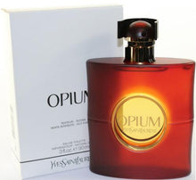 Load image into Gallery viewer, Opium Perfume by Yves Saint Laurent, Classy and sophisticated, Opium is one of the most famous Oriental perfumes in history. Sensual and aromatic, this fragrance has a vibrant, complex scent profile.  Notes: Top notes include a mix of spices and fruit dominated by clove, bergamot, coriander and plum. A sensual heart accord includes sandalwood, patchouli, peach and rose. These accords are rounded out by a long-lasting base 