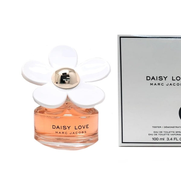 Daisy Love Perfume by Marc Jacobs, Crystallized cloudberries open the senses to what might seem a youthful dalliance.  Notes: Upon deeper study, however, the daisy tree’s earthy aroma at the fragrance’s heart adds an air of sophistication and subtlety. A warm undercurrent of cashmere musk and driftwood create the base tones that are so richly woven into Daisy Love’s foundation