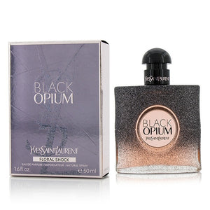 Black Opium Floral Shock Perfume by Yves Saint Laurent, Released in 2017, Black Opium Floral Shock is a women’s floral fruity gourmand fragrance with white floral, citrus, and fruity main accords. Its flacon is the same dark and square shape of the original Black Opium perfume, but has fading black sparkles that reveal pink.  Notes: The top notes are bergamot, lemon, pear, and freesia. In the middle are gardenia, orange blossom, white flowers, and solar notes.