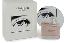 Load image into Gallery viewer, Calvin Klein Woman Perfume by Calvin Klein, Calvin Klein Woman is loaded with floral and woodsy undertones and is tailormade for the strong and independent woman of today.  Notes: Launched in 2018, this smart new fragrance titillates the senses with top notes of bergamot, grapefruit, lemon and eucalyptus. Heart notes of magnolia, jasmine, orange 