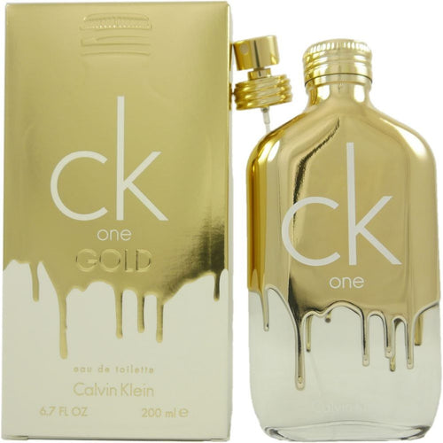 Ck One Gold Perfume by Calvin Klein, Drape yourself in the magnificence of glittering, shimmering Ck One Gold, a dazzling women’s fragrance. This enigmatic perfume combines woody, citrus and floral accords for a youthful and invigorating scent that works wonderfully for day wear.  Notes: Top notes of sparkling bergamot, herbal sage and rich fig open the aroma with a fresh energy that’s inspiring and rejuvenating. Meanwhile, heart notes of delicate violet, night-blooming jasmine