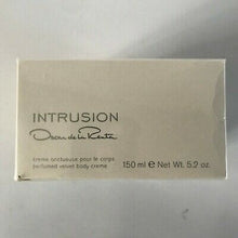 Load image into Gallery viewer, ntrusion Perfume by Oscar De La Renta, Intrusion was released in 2002.  Notes: It is a flowery and fruity scent combined with warmer notes, making it light and fresh enough for the day but also suitable for the evening. The perfume opens with top notes that consist of Sicilian bergamot, mandarin orange, neroli, grapefruit and star anise. The middle notes comprise gardenia, peony, lily and water jasmine and the base notes are musk, patchouli and amber