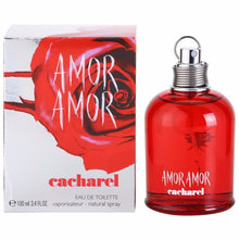 Load image into Gallery viewer, Amor Amor by Cacharel Perfume. Discover a women&#39;s fragrance as romantic as first love . A 2003 release by French fashion and fragrance brand Cacharel, Amor Amor exudes passion and youthful exuberance.  Notes:  Exotic floral essences and crisp citrus notes star in this feminine formula. Intoxicating and exotic Malati flower pairs with delicate lily-of-the-valley, while mandarin, blood orange and pink grapefruit add a lively cocktail of tart citrus.  Style: