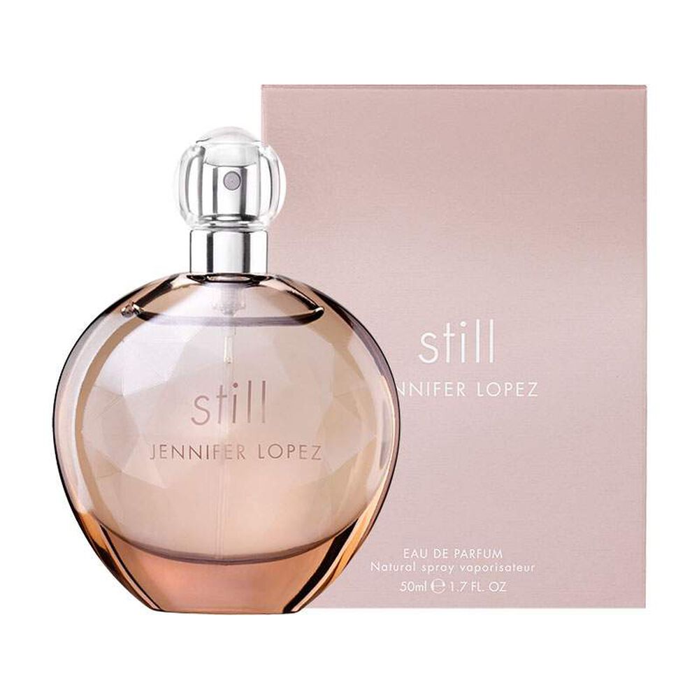 Still Perfume by Jennifer Lopez, Still is a clean and floral fragrance that was released in 2003 with top notes of white pepper, mandarin, Earl Grey tea, and sake. The scents heart contains freesia, rose, jasmine, orange blossom, and lily-of-the valley. The base notes are woody with sandalwood, musk, amber, orris, and pepper accords